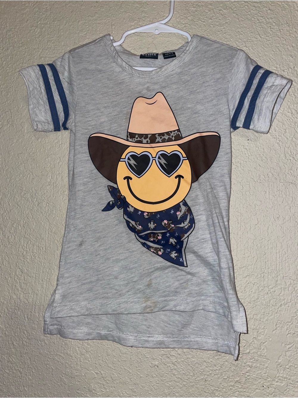 Cruel Girl Gray Tee with Smiley Cowboy Graphic and Blue Accents